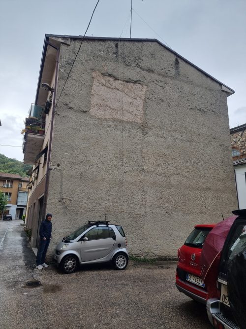 A picture showing the surface of the wall before the making of the Marching band mural by the artist Chus