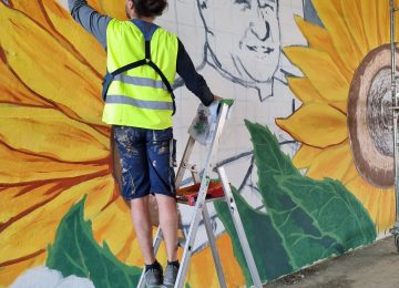 Chus working on the agriculture mural