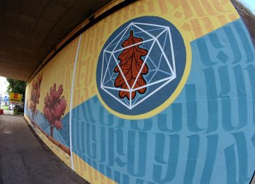 Photo of a detail of the oak leaf and the platonic geometry from the mural “terra”, by Chus and Ivan Tresoldi