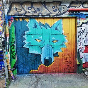 Mural portraying a wolf Street Art by Chus at Bolsjefabrikken in Copenhagen